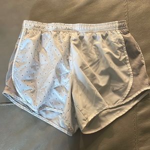 White star nike shorts.